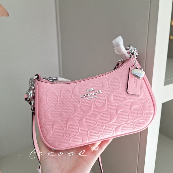 Coach Handbags - NWT Coach Teri Mini Crossbody Bag with Signature Leather Heart Charm CCZ29 pink